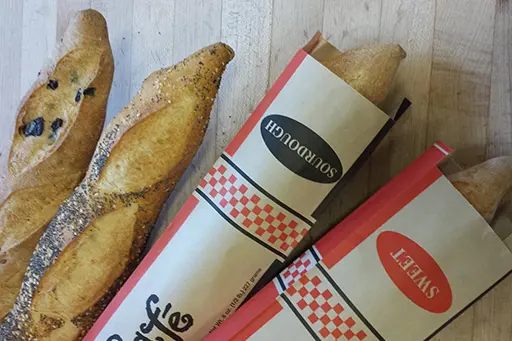 A close up of some bread in a box