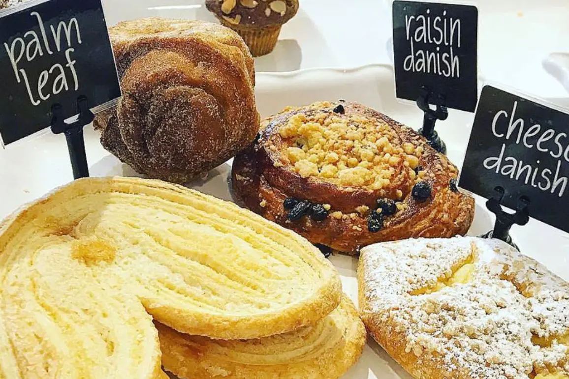 A variety of pastries are on display at the bakery.